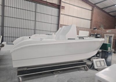 Orcat 4800 fibreglass hull under construction